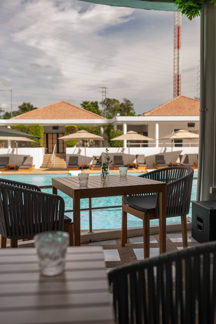 Cozy restaurant area overlooking the pool at KAIF Jungle Club & Spa